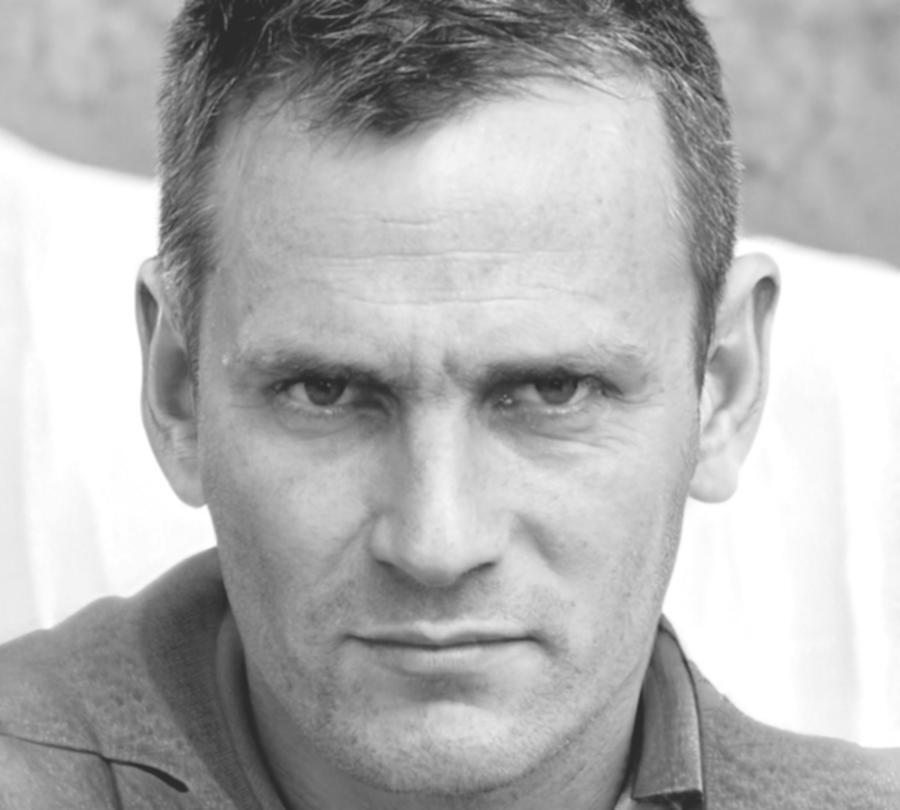 Portrait of Henrik Aldridge, instructor focused on service industry budgeting methods